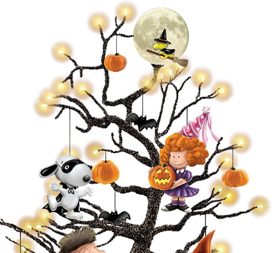 Pumpkin lights up Halloween tabletop tree